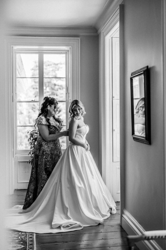 Bride gets ready for Brecknock Hall wedding with help from mom